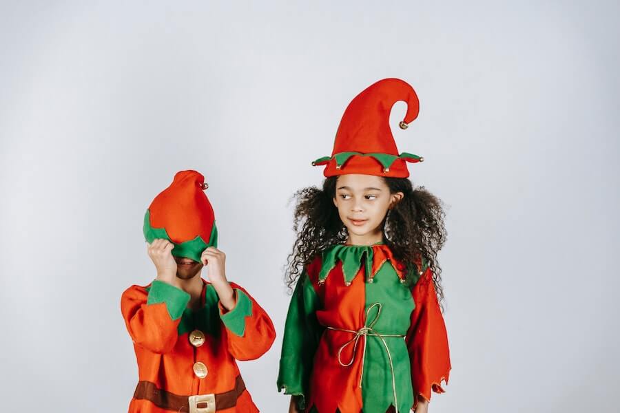 children dressed up as elves for funny family Christmas traditions