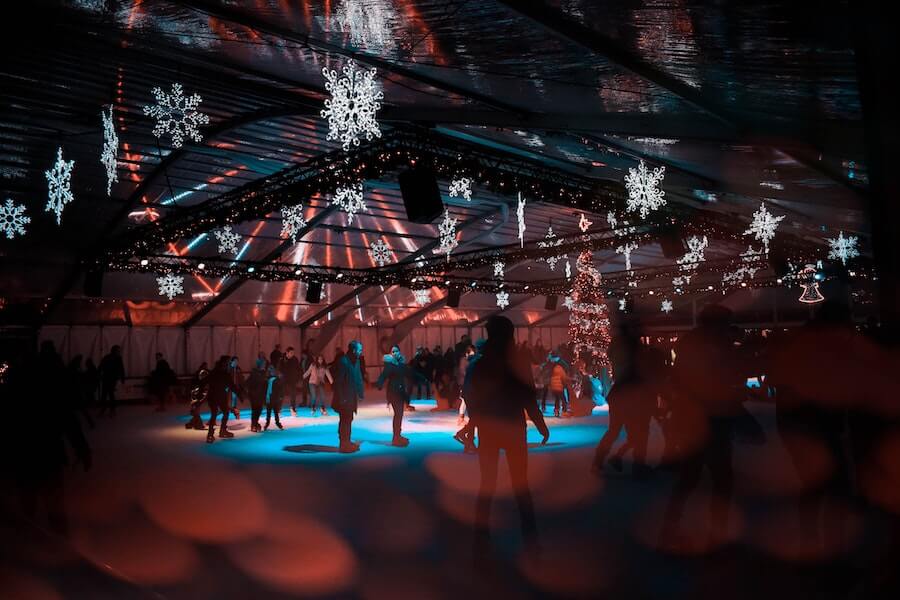 people in an ice skating rink for a staff Christmas party