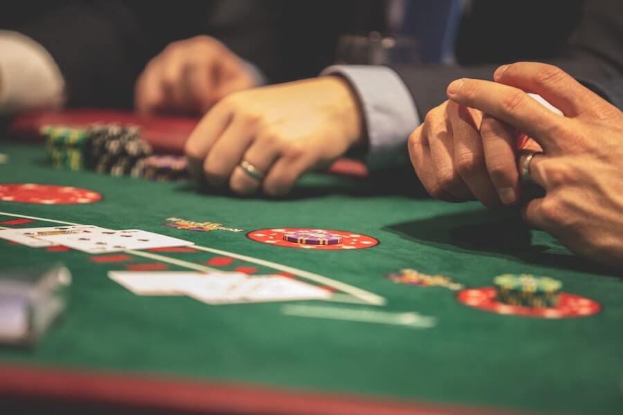 people playing poker in a casino at a staff Christmas party