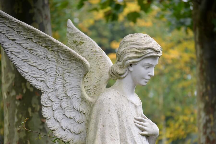 female angel sculpture for low- maintenance garden 