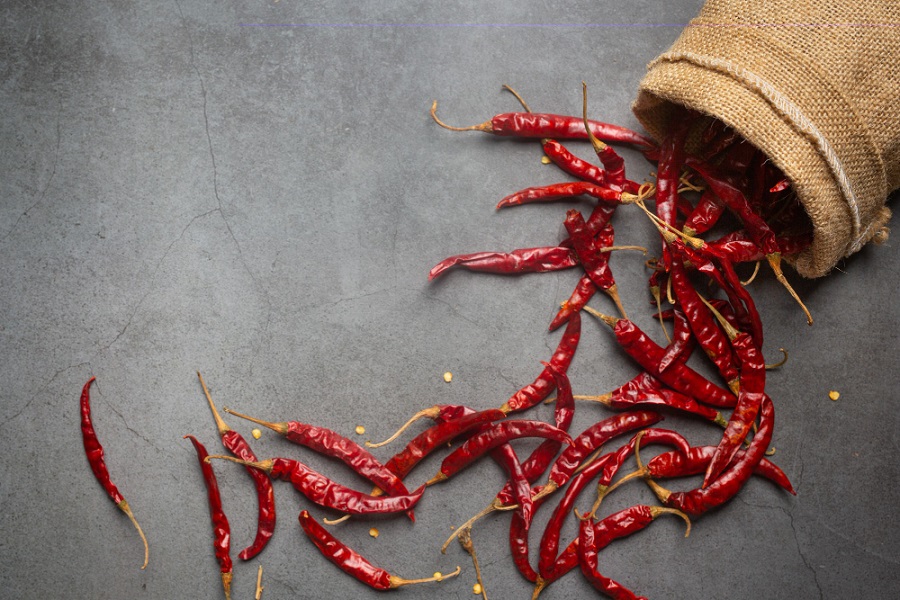 how to dry chillies scattered chillies out of a basket 